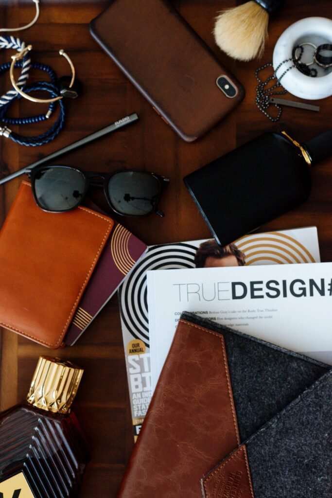 Assortment of men's accessories including watch and phone, fashion accessories for guys flat lay